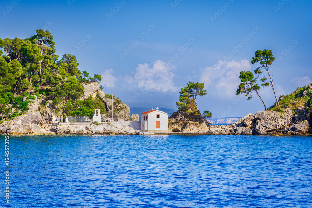 Parga, Greece. Panagia Chapel and turquoise Ionian Sea waters, Greek holiday