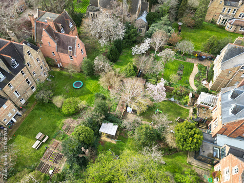 Historical Downtown Oxford Central City Homes of Oxfordshire, England United Kingdom. High Angle Drone's Camera Footage Was Captured March 23rd, 2024 From Medium High Altitude. photo