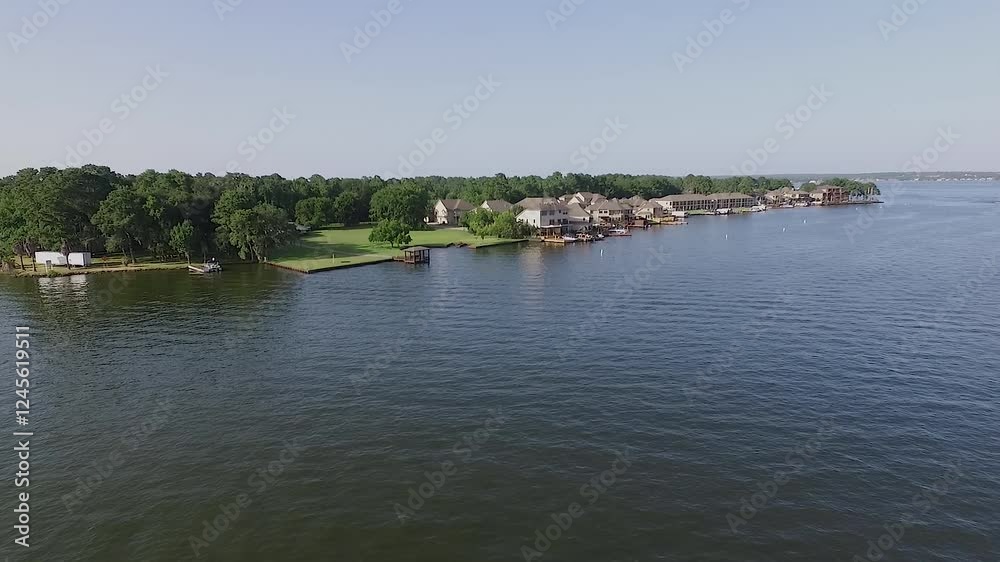 Pullout shot of homes on Lake Conroe, Montgomery County Texas United States. Pullout shot of homes on Lake Conroe, Montgomery County Texas United States.