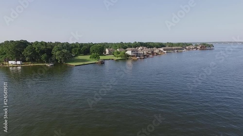 Pullout shot of homes on Lake Conroe, Montgomery County Texas United States. photo