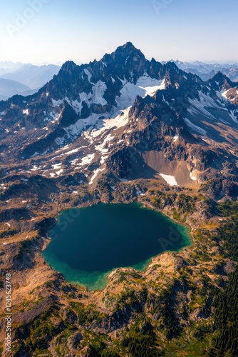 Alpine Lake Nestled Among Majestic Snowcapped Mountains