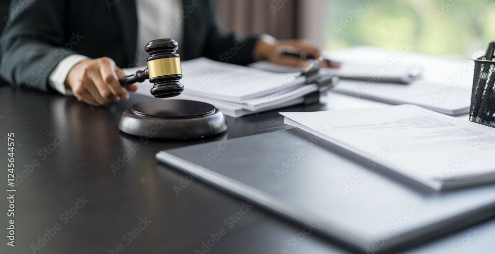 Lawyer businessman working with lawbook in office or courtroom Legal counsel with gavel and legal law. justice and lawyer concept Judge gavel hammer on Lawyer desk Lawyer businessman working with lawbook in office or courtroom Legal counsel with gavel and legal law. justice and lawyer concept Judge gavel hammer on Lawyer desk
