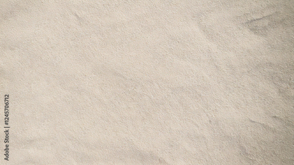 Naklejka premium Close-up of pale beige beach sand texture background