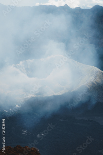 Volcano crater. Hiking. Mount Ruang Volcano Summit with Scenic Mountain View. Indonesia photo