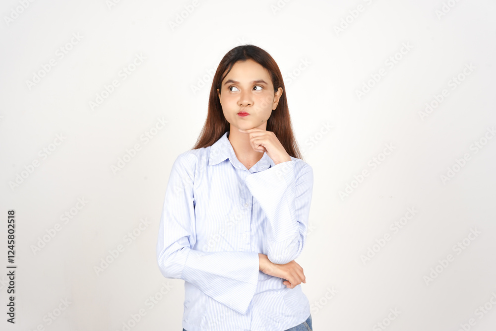 Looking side hand on chin doing thinking gesture Of Beautiful Asian Woman wearing Casual Attire Isolated On White Background Looking side hand on chin doing thinking gesture Of Beautiful Asian Woman wearing Casual Attire Isolated On White Background