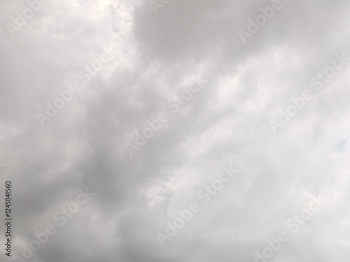 SKY Having Dense Dark Clouds. Blue SKY With Deep Dark Couds, Dense Cloudy Weather with White Clouds Background. Cloudy SKY, Ornamental Clouds, SKY Having Large Rainyclouds with Thunderstorm WEATHER. photo