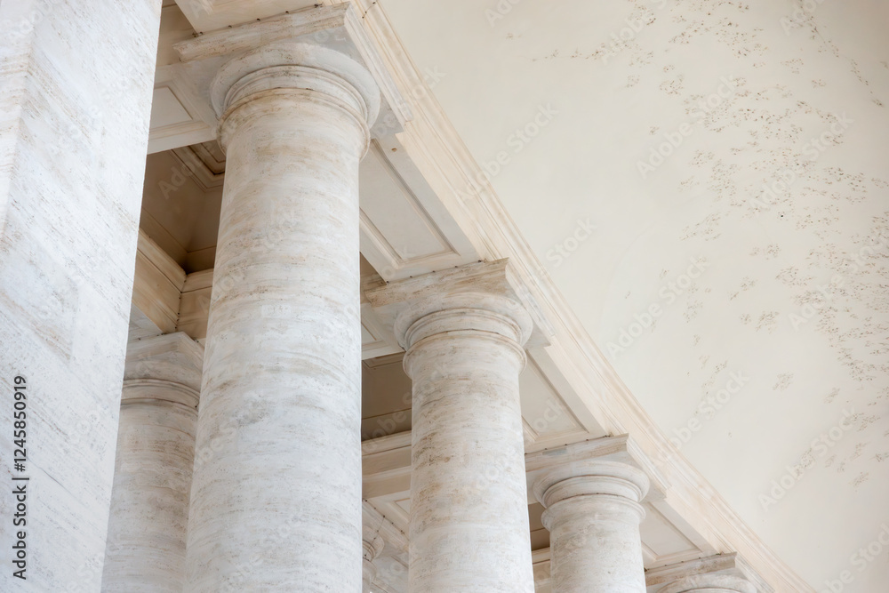 Close up of white travertine marble columns and pillars in Rome, by the Vatican city Close up of white travertine marble columns and pillars in Rome, by the Vatican city