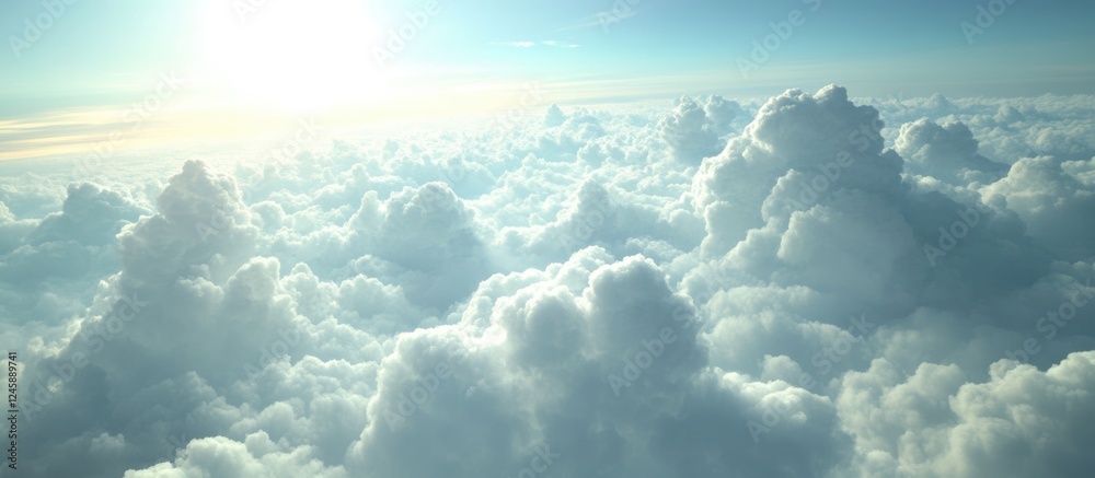 Naklejka premium Fluffy white clouds illuminated by sunlight against a serene blue sky creating a peaceful and dreamy atmosphere.