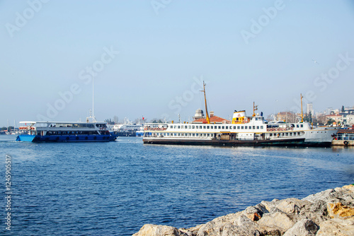 view of ferries in the Bostanci Harbor in istanbul in the winter day photo