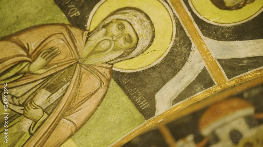Close-up shot of the wall paintings on the ceiling of the Church St. Teodor Tiron and St. Teodor Stratilat in the village of Dobarsko in Bulgaria. Close-up shot of the wall paintings on the ceiling of the Church St. Teodor Tiron and St. Teodor Stratilat in the village of Dobarsko in Bulgaria.