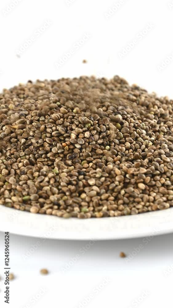 Hemp seeds, close-up. Source of protein and amino acids. Healthy eating. Vegan food. Hemp seeds, close-up. Source of protein and amino acids. Healthy eating. Vegan food.