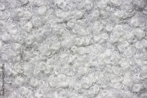 Real white sheep wool texture for pattern and background.