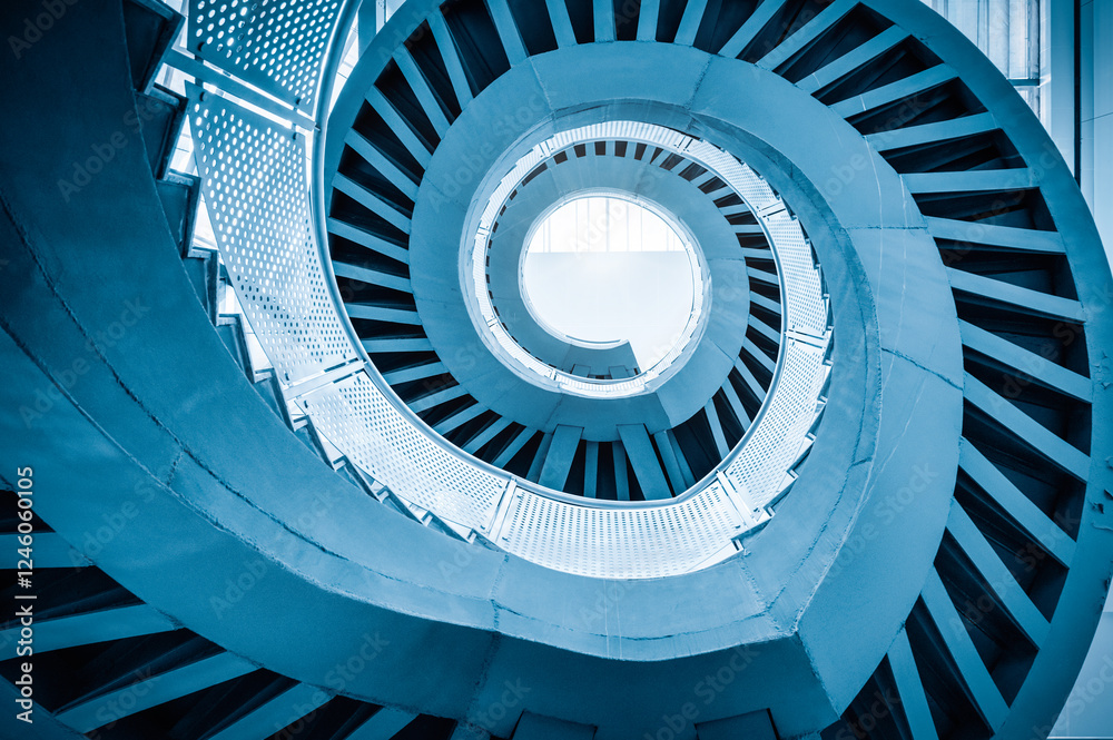 spiral staircase ascending to the light