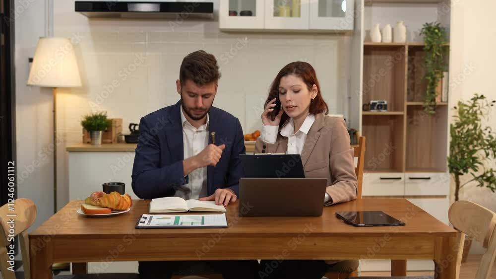 Business team analyzing documents, graphs, and data with a laptop, tablet, and smartphone. Collaboration, strategy, and success in a modern office. Business team analyzing documents, graphs, and data with a laptop, tablet, and smartphone. Collaboration, strategy, and success in a modern office.
