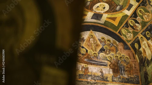 Paintings of Jesus and other religious saints and ions in a rocket Church of St. Teodor Tiron and St. Teodor Stratilat in the village of Dobarsko in Bulgaria. photo