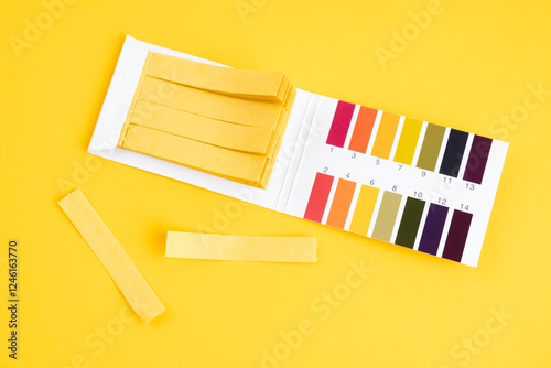 universal indicator paper with acidic testing.