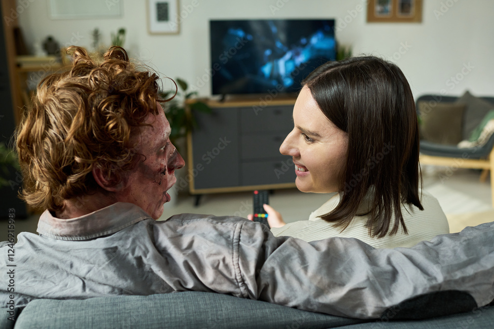 Fototapeta premium Unusual Young Couple Discussing Movie