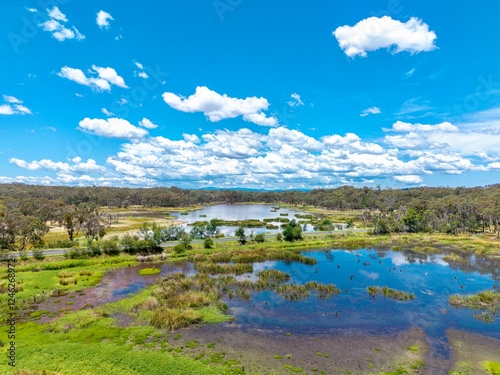 Aerial View of a landscape with lake and blue sky, near Emmaville, NSW, Australia  photo