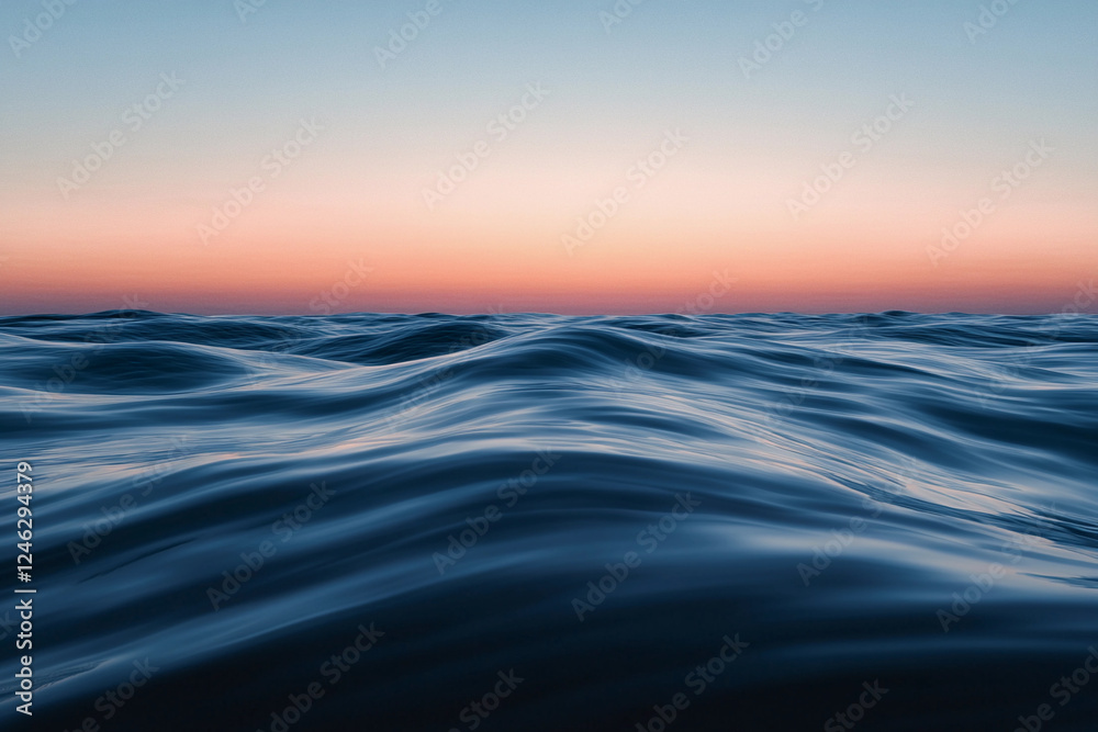 Sunset over calm ocean waters creates a serene atmosphere with vibrant colors on the horizon Sunset over calm ocean waters creates a serene atmosphere with vibrant colors on the horizon