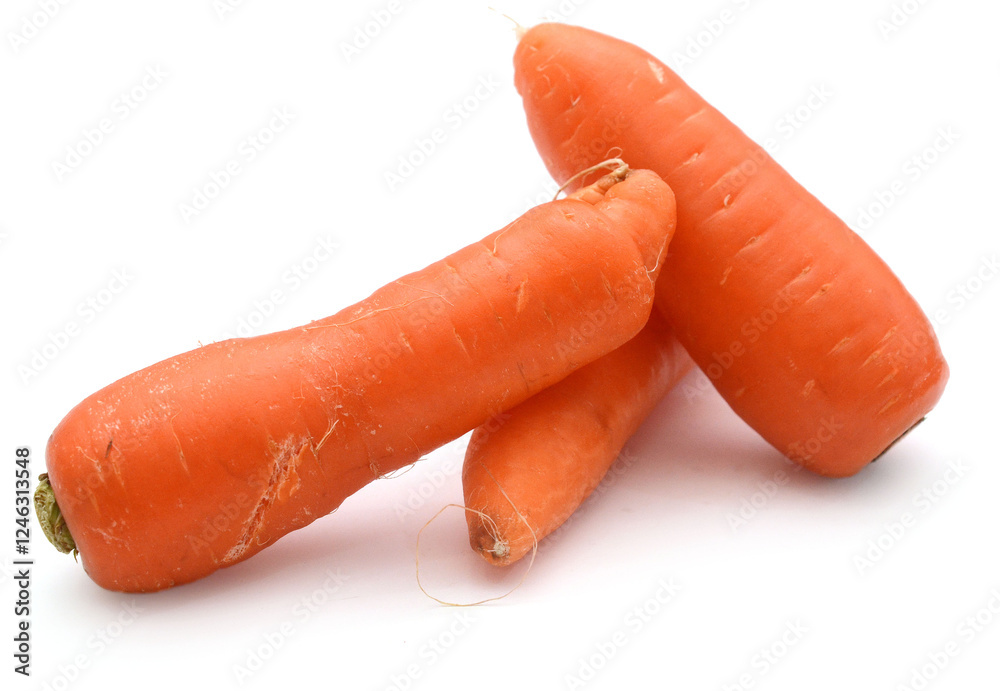 There are carrots on a white background - stock photo
There are carrots on a white background - stock photo