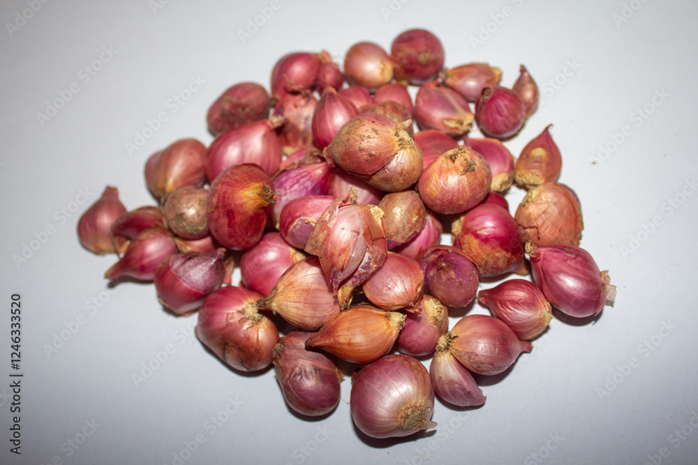 Portrait of red onions on a plain white background.
Pinrang, South Sulawesi Indonesia.
February 06 2025 Portrait of red onions on a plain white background.
Pinrang, South Sulawesi Indonesia.
February 06 2025