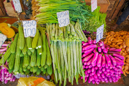 wide variety seasonal vegetables and fruits Crowded central food Market Colombo.