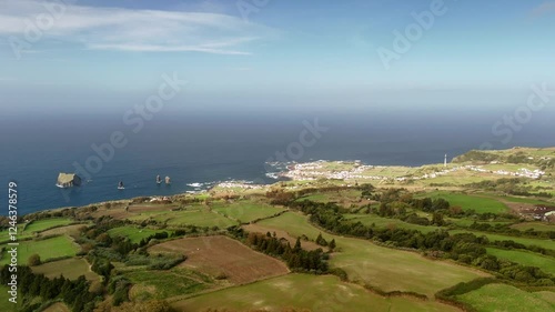 Mosteiros, Azores from a bird's-eye view. The Atlantic Ocean, with its powerful waves crashing against the rugged coastline.
A black sand beach and cliffs, formed from solidified lava, stand as a tes