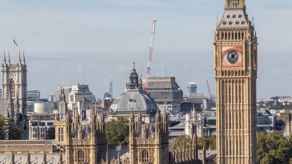 Fototapeta premium big ben in london, england with the clock face replaced with eye