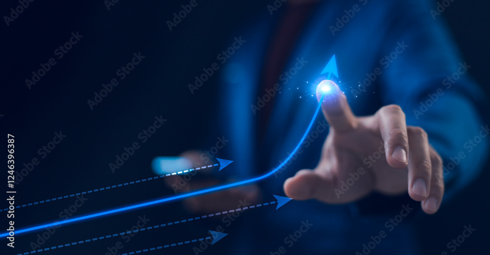 Businessman touching a glowing upward arrow, business growth and success growing growth concept. Pointing arrow graph corporate future growth plan. Successful business development plan.