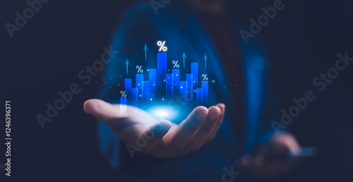 Hand holding graph with percentage, interest rate and dividend concept, income and return on investment in percentage. Retirement, compensation fund, investment, dividend tax, stock market