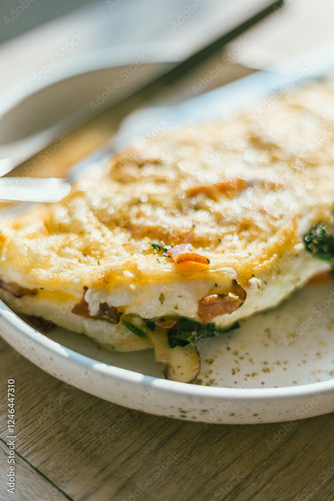 omelet with spinach and ham. omelet with spinach and ham.