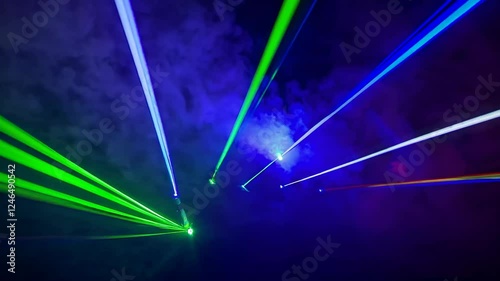Laser light display creates mesmerizing patterns in colorful smoke at nighttime event