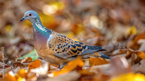 Colorful pigeon foraging among vibrant autumn leaves in a serene park setting