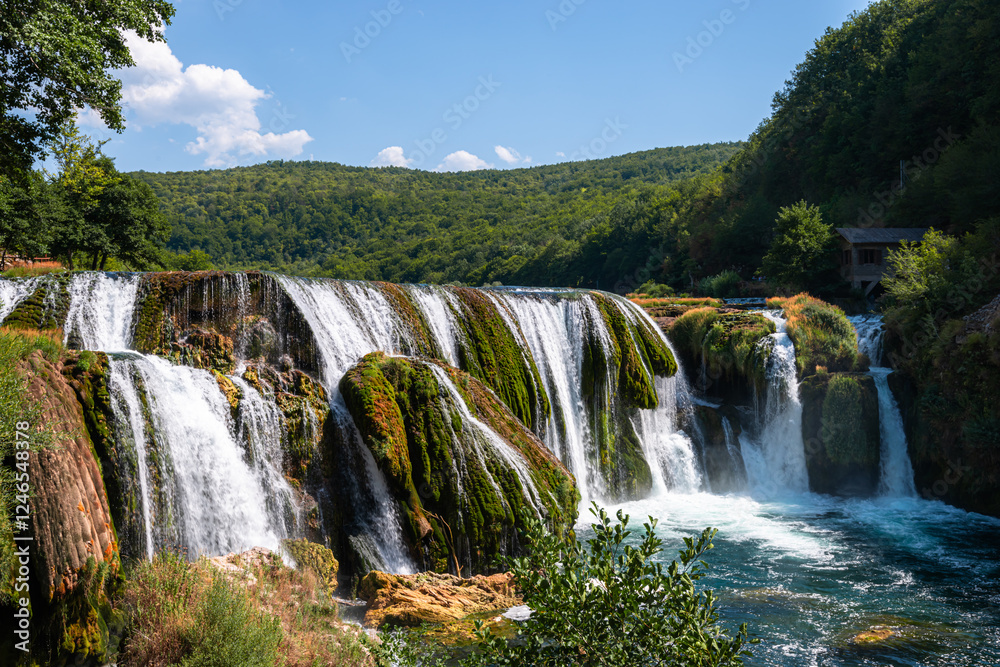 Fototapeta premium Una River, Waterfall in Strbacki buk on summer day, Una river. Bosnia and Herzegovina.