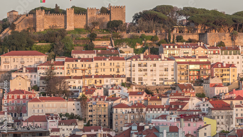 Castle Castelo de Sao Jorge Belevedere aerial timelapse from Miradoura de Sao Pedro de Alcantara viewpoint. Portugal photo