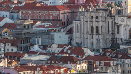 Baixa district with Santa Justa Lift timelapse also called Carmo Lift and Convento da Ordem do Carmo historical church. Lisbon photo