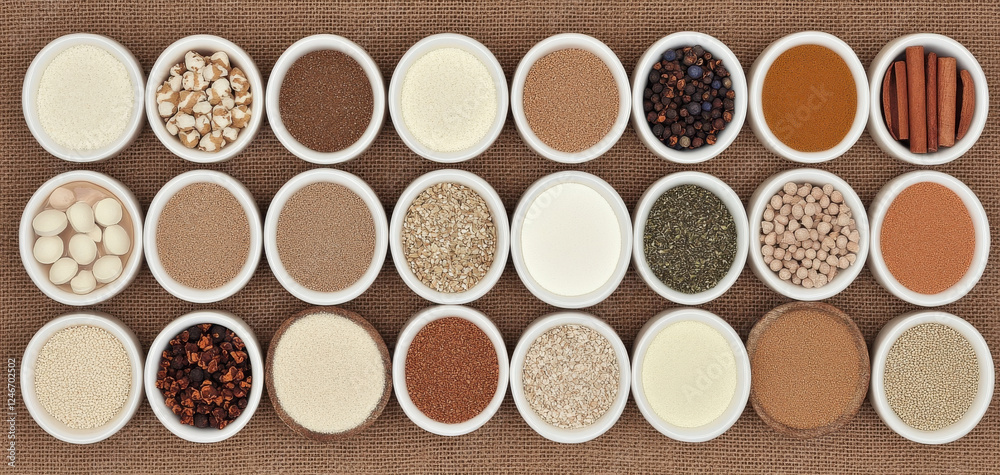 A vibrant assortment of spices and herbs in small bowls, showcasing aromatic seasonings and natural ingredients for gourmet cooking. emphasizing fresh and aromatic cooking traditions. A vibrant assortment of spices and herbs in small bowls, showcasing aromatic seasonings and natural ingredients for gourmet cooking. emphasizing fresh and aromatic cooking traditions.