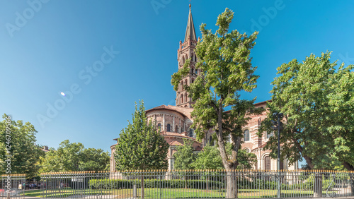 Tableau sur toile The cobbled parvis of the Basilica of Saint Sernin in Toulouse, France, timelapse hyperlapse