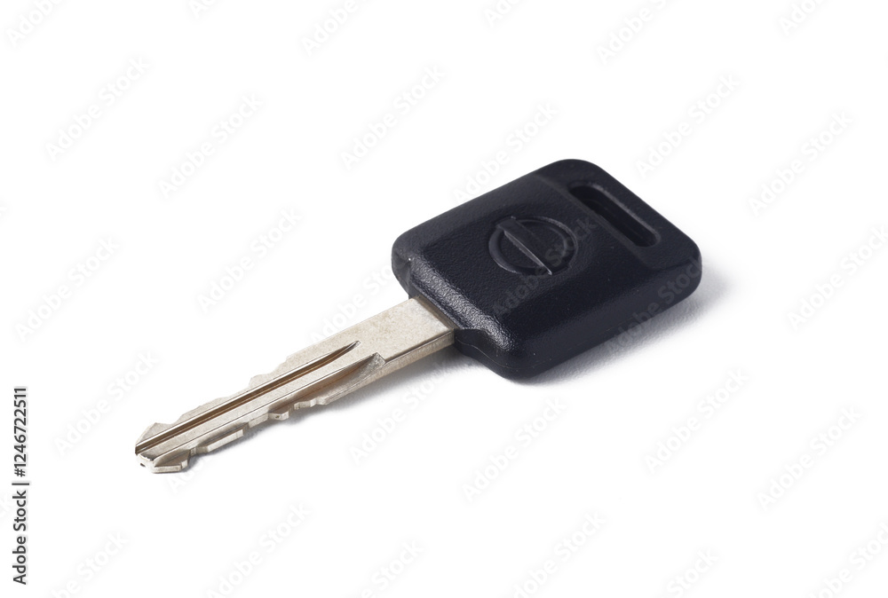 A car key isolated on white. A car key isolated on white.