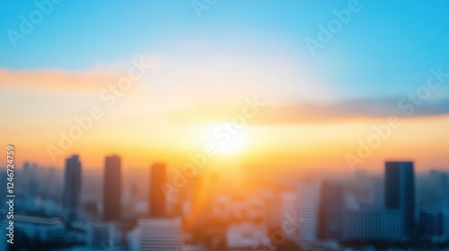 A city skyline with a bright orange sun in the sky