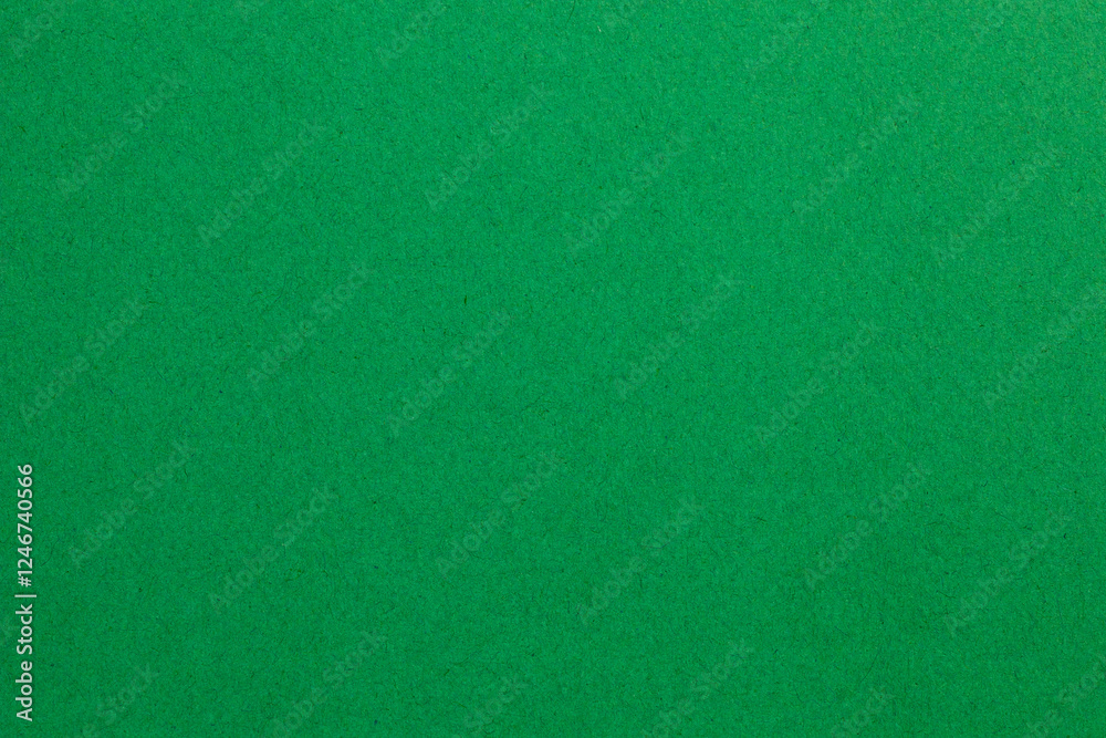 A green background with no visible objects, textured origami paper backdrop A green background with no visible objects, textured origami paper backdrop