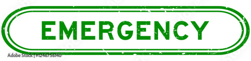 Grunge green emergency word rubber seal stamp on white background