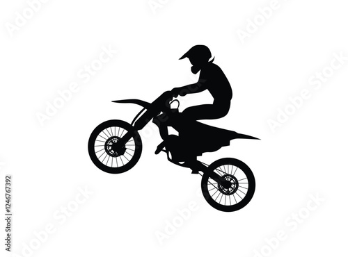 silhouette of a man riding a motorcycle