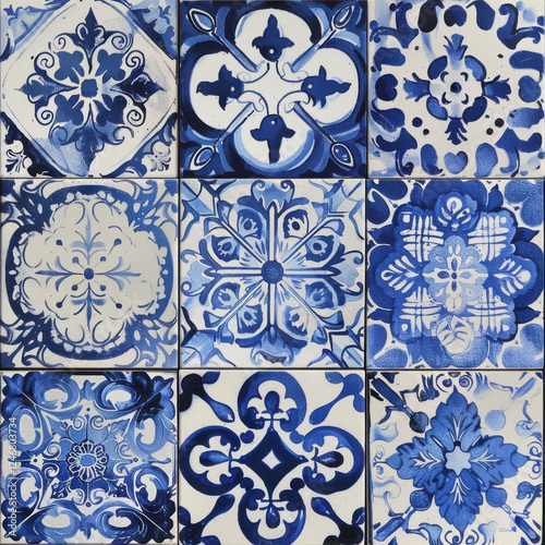 collection of blue and white decorative tiles featuring intricate patterns and designs, showcasing traditional craftsmanship and artistry