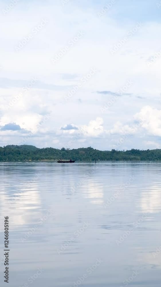 Beautiful view of the lake when we ride the boat from the Henferd Land tourist attraction, Kampar Regency, Riau, Indonesia. Beautiful view of the lake when we ride the boat from the Henferd Land tourist attraction, Kampar Regency, Riau, Indonesia.