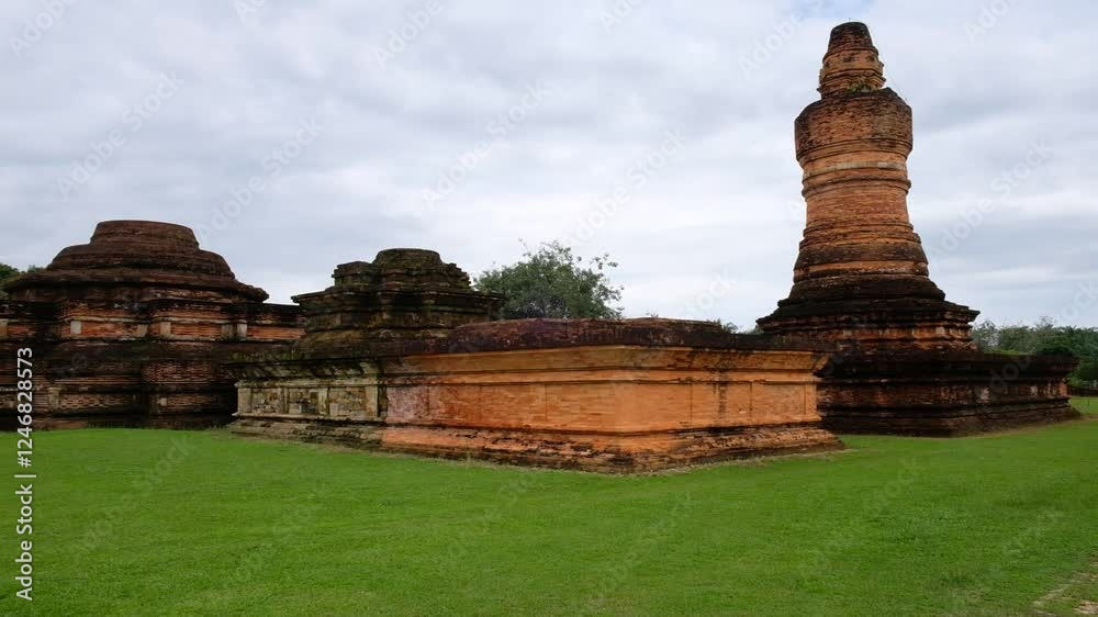 Muara Takus Temple is a Buddhist temple complex, thought to belong to the Srivijaya empire that located in Kampar Regency, Riau, Indonesia. Muara Takus Temple is a Buddhist temple complex, thought to belong to the Srivijaya empire that located in Kampar Regency, Riau, Indonesia.