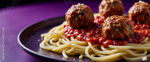 Vegan Spaghetti with Meatless Meatballs – A Classic Alternative for Italian Cuisine and Healthy Living
A plate of spaghetti with plant-based meatballs in rich tomato sauce, showing how traditional dis photo