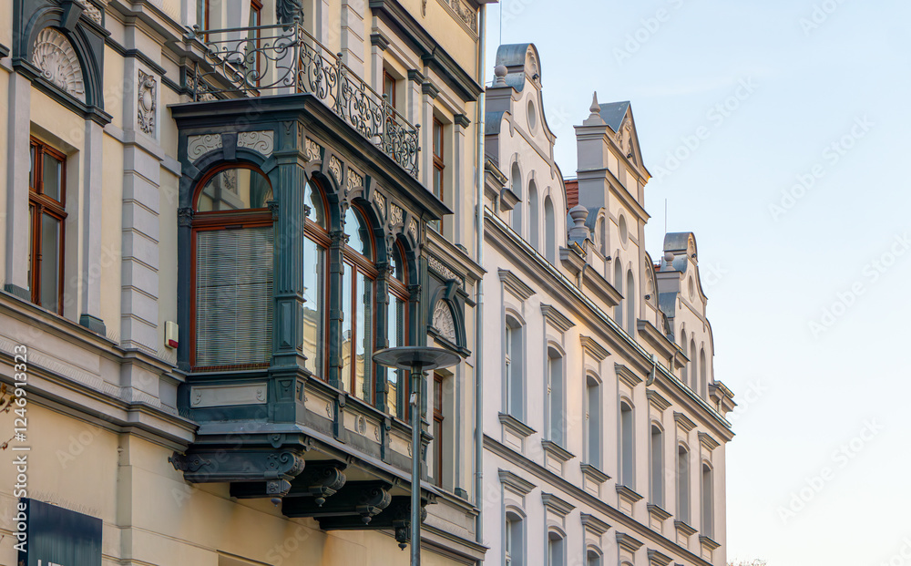 Fototapeta premium urban architecture, old buildings of residential tenement houses. tenement houses with various beautiful decorations. buildings after renovation in the city.