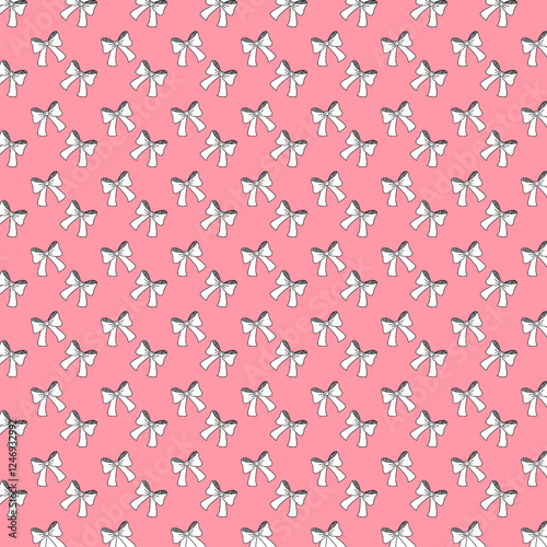 Pink background with bow pattern
