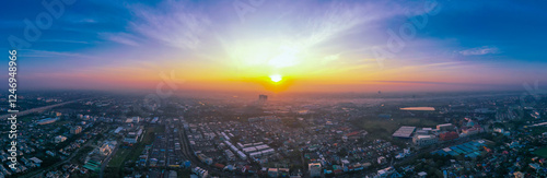 Wallpaper Mural view of sunset city skyline, transportation with cars on Expressway, Road, Roundabout, multilevel junction highway-Top view. Important infrastructure, cloudscape, cityscape, building, crane. Torontodigital.ca